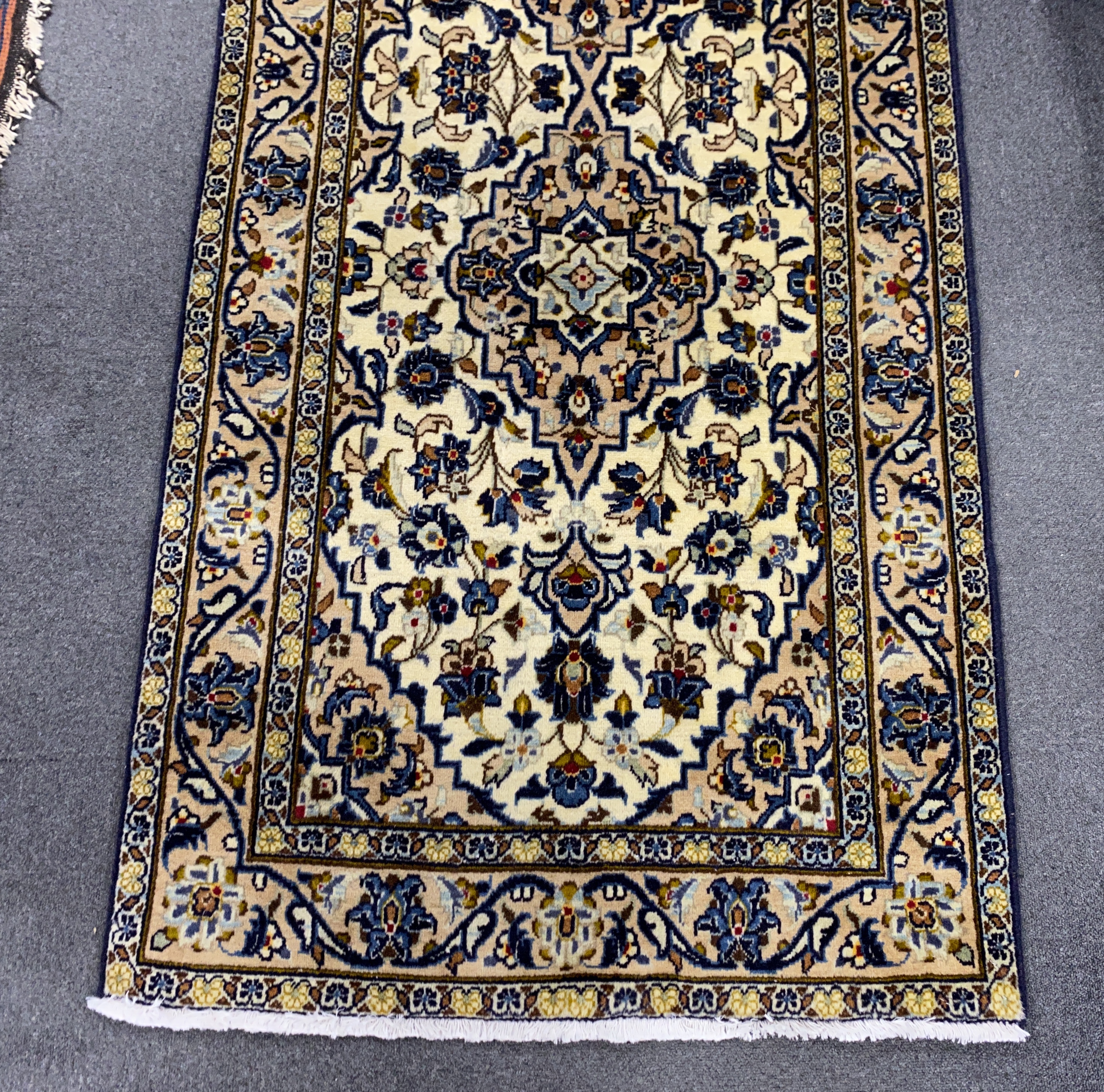 A North West Persian ivory ground runner, 400 x90cm